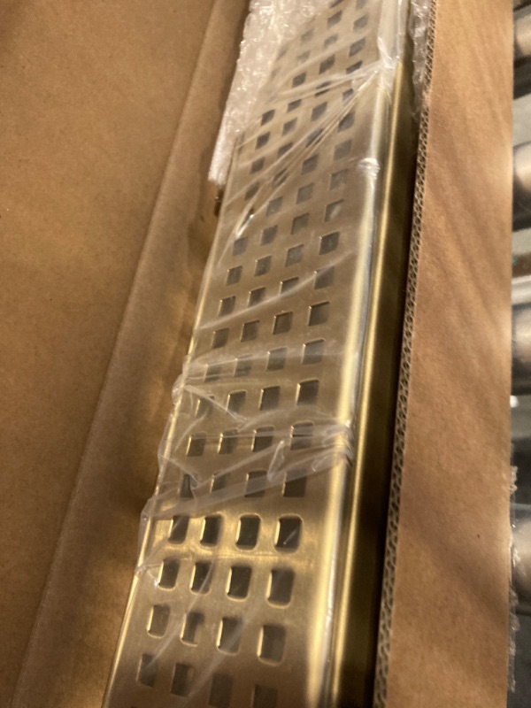 Photo 2 of WEBANG 24 Inch Shower Linear Gold Drain Rectangular Floor Drain with Accessories Square Hole Pattern Cover Grate Removable SUS304 Stainless Steel CUPC Certified Brushed Gold Brass Brushed Gold 24 Inch