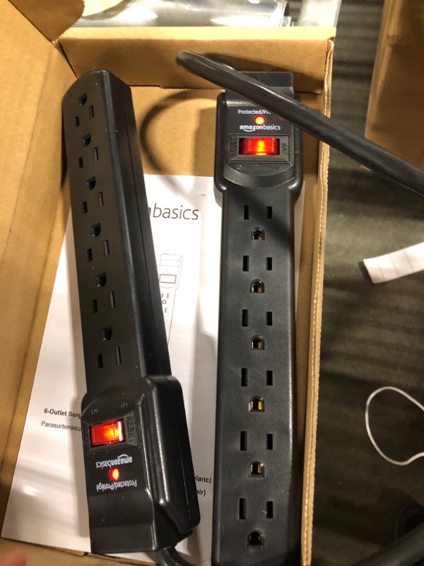 Photo 3 of Amazon Basics 6-Outlet, 200 Joule Surge Protector Power Strip, 2 Foot, Black - Pack of 2 Black Strip