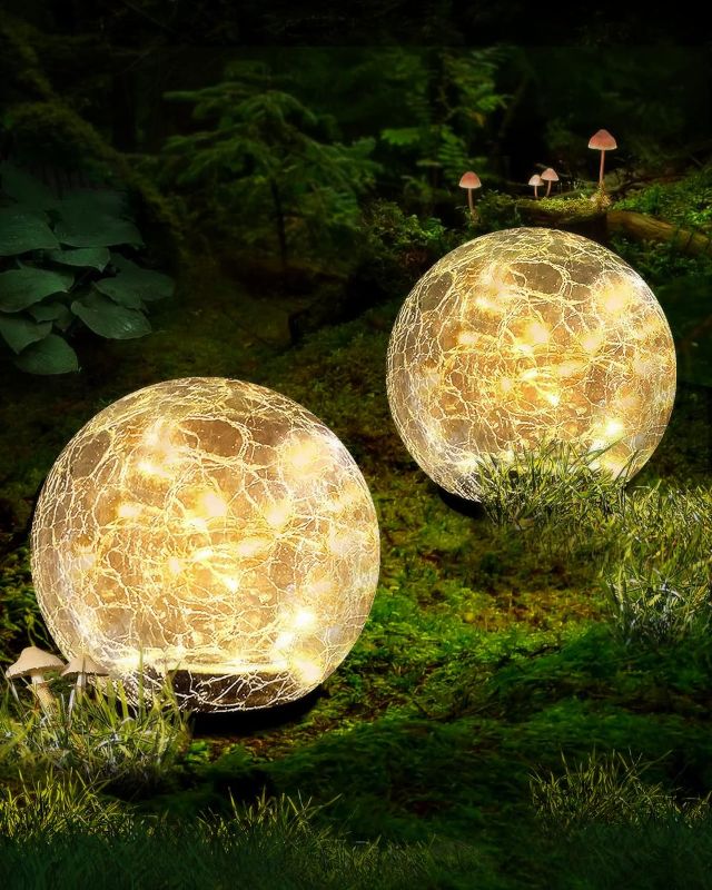 Photo 1 of **ONE NON FUNCTIONING** 
Garden Solar Ball Lights Outdoor Waterproof, 50 LED Cracked Glass Globe Solar Power Ground Lights for Path Yard Patio Lawn, Christmas Decoration Landscape Warm White(2 Pack 4.7'')