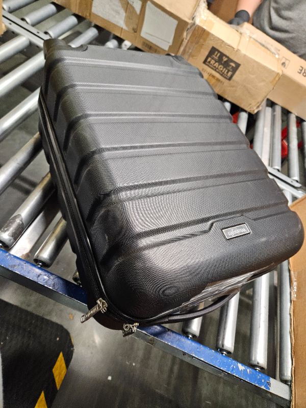 Photo 3 of **GOOD USED**Wrangler Hardside Carry-On Spinner Luggage, Black, 20-Inch Carry-On 20-Inch Black