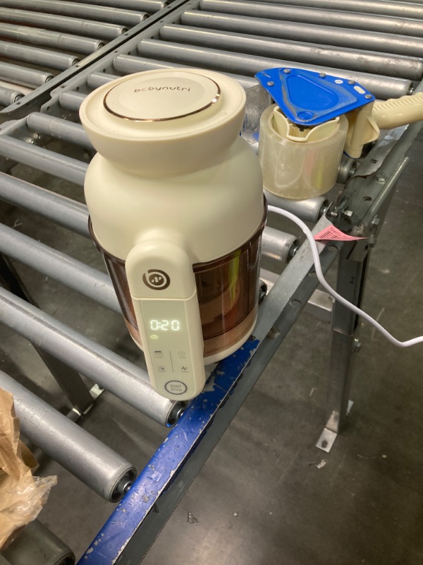 Photo 1 of ***NOT FUNCTIONAL*** SELLING AS PARTS****BABYNUTRI Auto Glass Baby Food Maker, Baby Food processor, Blender & Steamer, Baby Steamer and Puree Machine with Auto Cooking & Easy Cleaning, Dishwasher Safe, Cook at Home, Touch Screen Control Beige