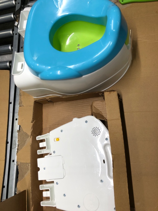 Photo 1 of Fisher-Price Potty Training Seat with Lights Sounds and Phrases, Toddler Toilet with Removable Seat, Learn-to-Flush Potty Learn-to-Flush Potty Frustration Free Packaging Frustration-Free Packaging