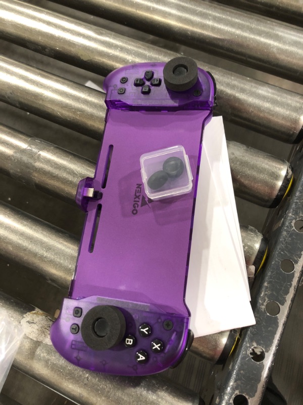 Photo 1 of NexiGo Hall Effect Gripcon with Kickstand and HDMI Out for TV Docking, Hall Sensing Joystick for Switch/Switch OLED, Handheld Mode, 4K/1080P Supported HDMI and USB 3.0 Port, Purple Hall Stick with Kickstand Purple