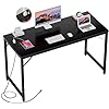 Photo 1 of iSunirm 55 Inch Computer Desk with Magic Power Outlets, Modern Office Desk with USB Charging Ports, Sturdy Student Writing Desk, Simple Laptop PC Gaming Table for Bedroom Workstation, Black 55 Inch 1 Pack Black
