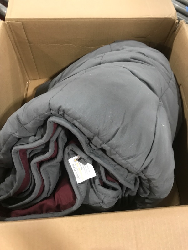 Photo 1 of 88 by 104 weighted blanket 35 lbs 
