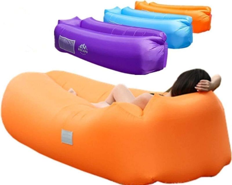 Photo 1 of WEKAPO Inflatable Lounger Air Sofa Chair–Camping & Beach Accessories–Portable Water Proof Couch for Hiking, Picnics, Outdoor, Music Festivals & Backyard–Lightweight and Easy to Set Up Air Hammock ORANGE
