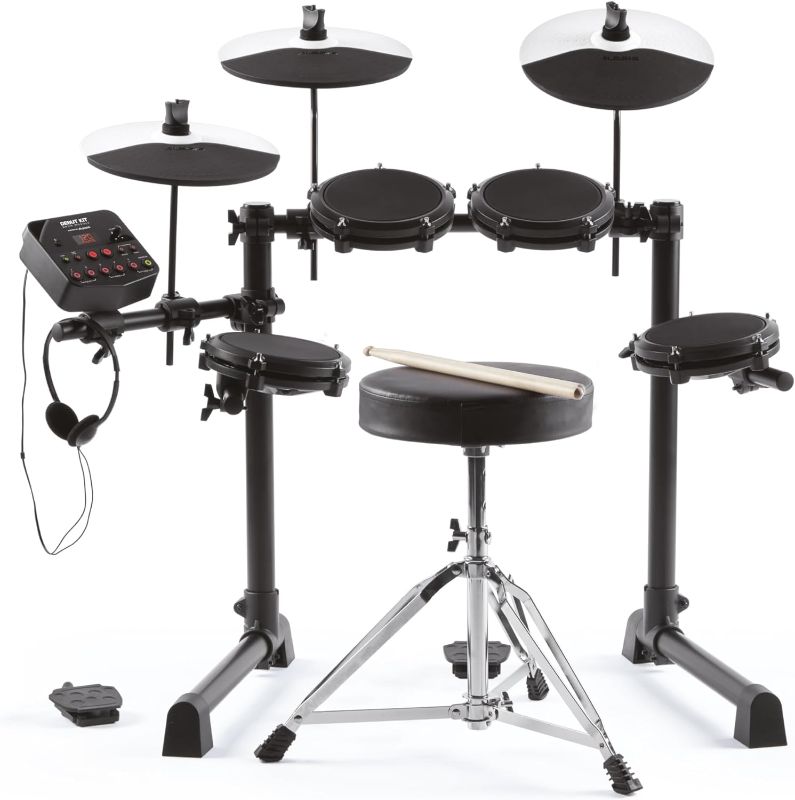 Photo 1 of Alesis Drums Debut Kit – Kids Drum Set With 4 Quiet Mesh Electric Drum Pads, 120 Sounds, Drum Stool, Drum Sticks, Headphones and 100 Melodics Lessons
