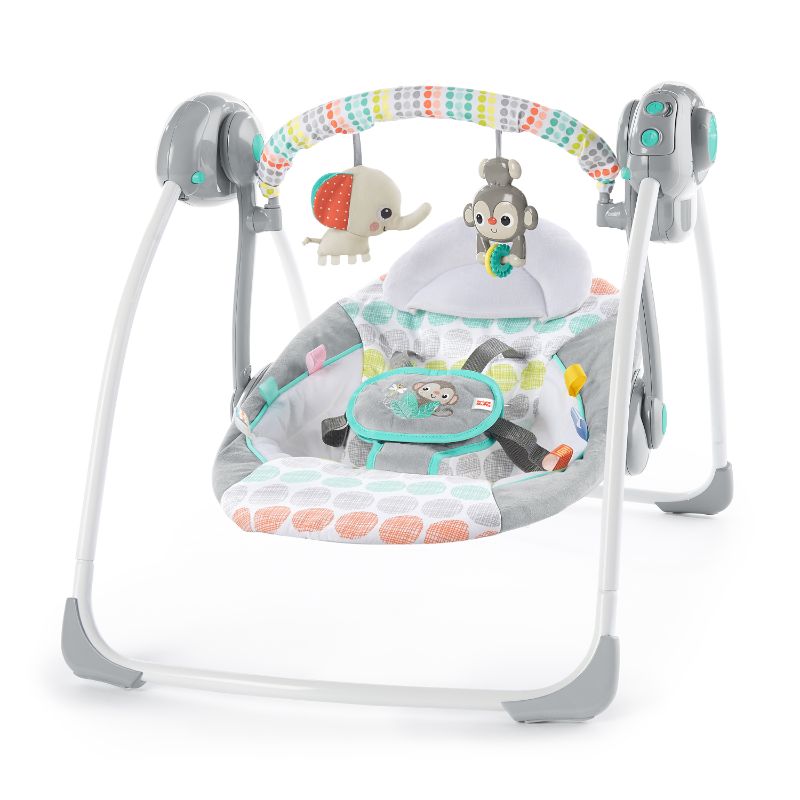 Photo 1 of Bright Starts, Whimsical Wild Portable Compact Automatic Baby Swing with Music and Taggies, Removable Toy Bar with 2 Toys, Reclinable, 5 Point