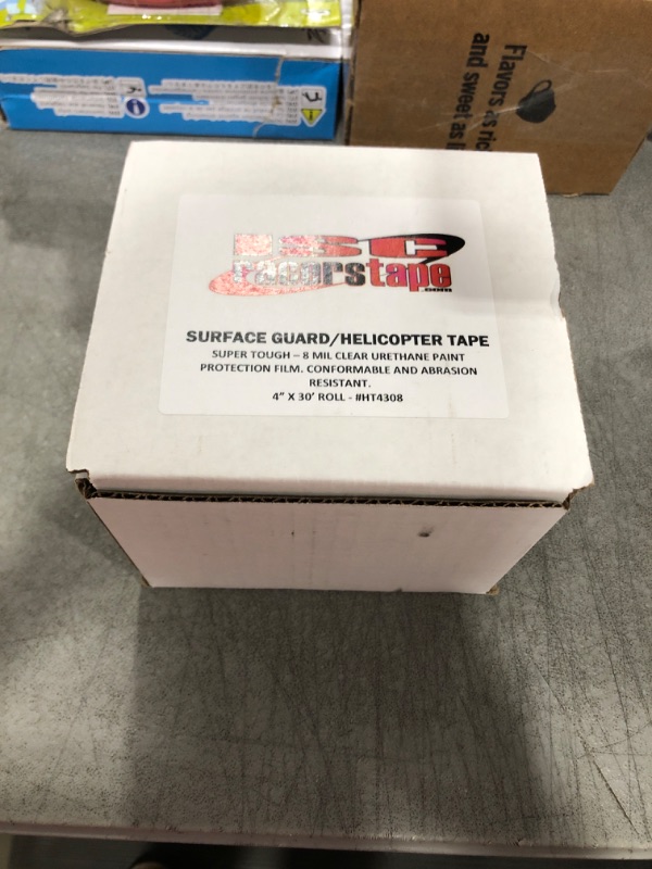 Photo 2 of ISC Racers Tape HT4308 ISC Helicopter-OG Surface Guard Tape (8 mil Outdoor Grade): 4" x 30 ft., Transparent
