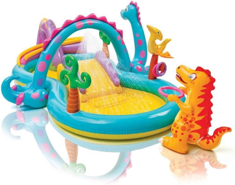 Photo 1 of Intex 11ft x 7.5ft x 44in Dinoland Backyard Play Center Kiddie Inflatable Swimming Pool with Slide, Dino Arch Water Sprayer and Games for Ages 2 and Up
