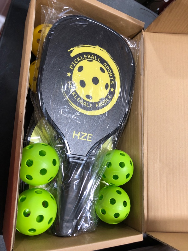 Photo 2 of HZE Pickleball Paddles Set of 4, Pickleball Set with Ergonomic Cushion Grip, Wooden Pickleball Paddles Set with 8 Pickleball Balls & 1 Carry Bag for Women Men Beginners & Intermediate Players Yellow & Black