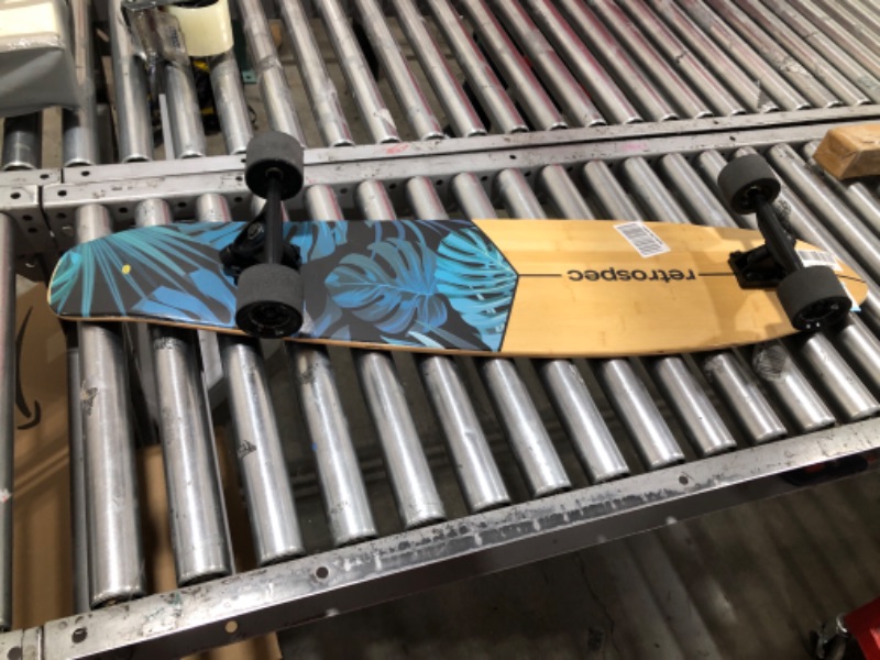 Photo 2 of Retrospec Zed Longboard Skateboard Complete Cruiser | Bamboo & Canadian Maple Wood Cruiser w/ Reverse Kingpin Trucks for Commuting, Cruising, Carving & Downhill Riding Cruiser Dark Tropics