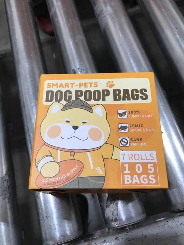 Photo 1 of 100% Certified Home Compostable Dog Poop Bags - EN 13432 Compliant Dog Waste Bags -105 Bags- 7 x Rolls of Plant Based Compostable Poop Bags -Includes A Dispenser-Thick Doggie Poop Bags?Orange?