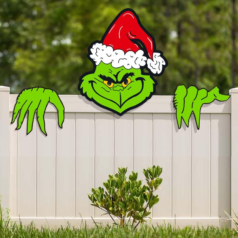 Photo 1 of Christmas Decorations Outdoor - Fence Yard Sign with Hand Head for Holiday Christmas Fence Peeker Decorations
