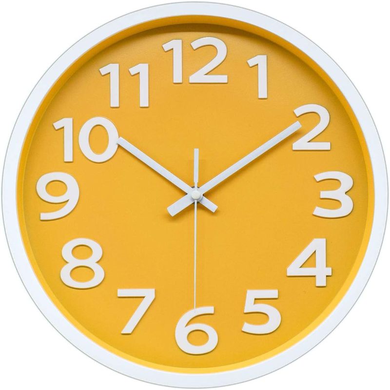 Photo 1 of 12 Inch Modern Wall Clock Silent Non-Ticking Battery Operated 3D Numbers Bright Color Dial Face Wall Clock for Home/Office Decor,Yellow
