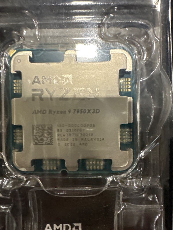 Photo 2 of AMD Ryzen™ 9 7950X3D 16-Core, 32-Thread Desktop Processor SN : 9lw3871o30219