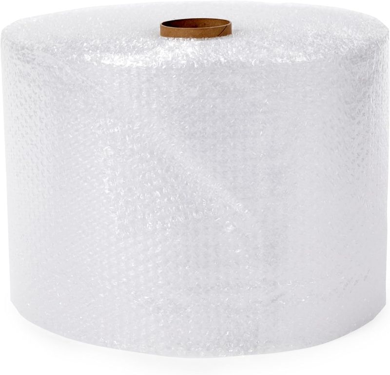 Photo 1 of Amazon Basics Perforated Bubble Cushioning Wrap, Small 3/16", 12-Inch x 175 Foot Long Roll, Clear
