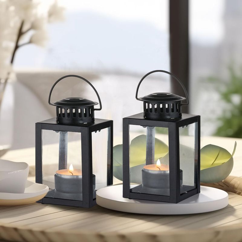 Photo 1 of Black Lanterns Decorative Set of 2, Small Indoor Glass Candle Holder Table Centerpiece with Metal Frame for Christmas Wedding Halloween, 3.9" Hanging Home Candleholders Decor
