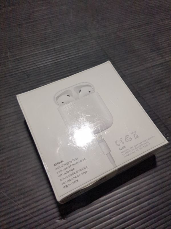 Photo 3 of Apple AirPods with Charging Case (Latest Model)