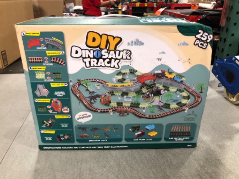 Photo 2 of JONRRYIN Dinosaur Train Track Set, 2 in 1 Dino Race Car Track, 259 pcs Flexible Dinosaur Track Toys Set with 4 Dinosaurs Toys, Electric Train Set with Car Toy & Sound Train Toys for Children Aged 3-6 