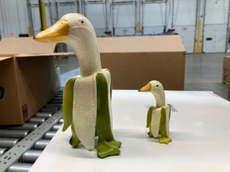 Photo 3 of Barydat 4 Pcs Banana Duck Decor Statue Creative Resin Banana Duck Sculpture Funny Whimsical Peeled Yellow Banana Duck Art Figurine for Yard Outdoor Home Garden Lawn Patio Office Gifts(Green) https://a.co/d/3ttBmON