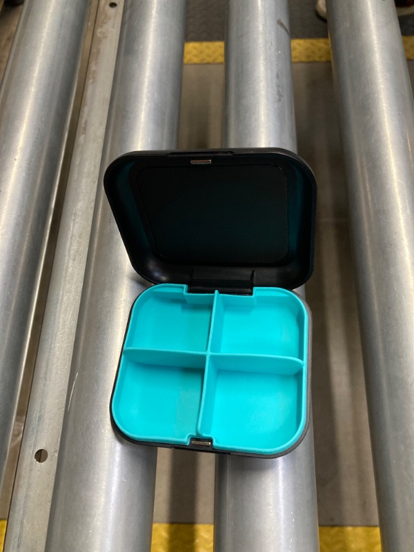 Photo 3 of Pill Box Portable Pill Dispensing Box, Travel Portable Pill Box, 4-Compartment Daily Portable Pill Organizer, Suitable for Vitamins, Medicines, Fish Oil (Black+Cyan) https://a.co/d/8FWOP7k