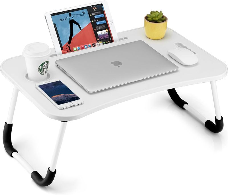 Photo 1 of Brand: FISYOD
4.5 4.5 out of 5 stars 704
FISYOD Foldable Laptop Table, Portable Lap Desk Bed Table Tray, Laptop Stand with Cup Holder & Tablet Slot & Lifting Handle for Working Writing Drawing & Eating 