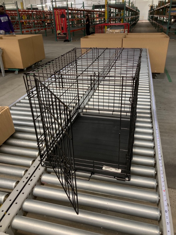 Photo 2 of New World Newly Enhanced Single Door New World Dog Crate, Includes Leak-Proof Pan, Floor Protecting Feet, & New Patented Features, 24 Inch