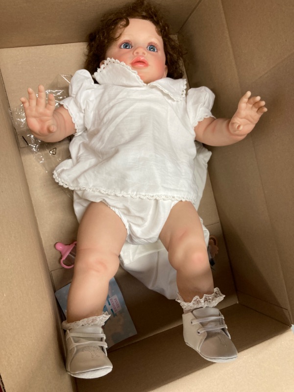 Photo 1 of Cradle 26 Inch Realistic Reborn Toddler Girl Doll Handmade Silicone Soft Vinyl Real Looking Reborn Baby Doll Lifelike Newborn Baby Dolls Toy 