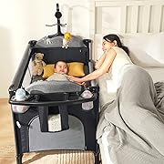 Photo 1 of MMBABY 5-in-1 Pack and Play Portable Crib for Baby,Multifunction Bedside Crib from Newborn to Toddlers,U-Shaped Diaper Changer,Playard,Safety Strap,Carry Bag (Black)