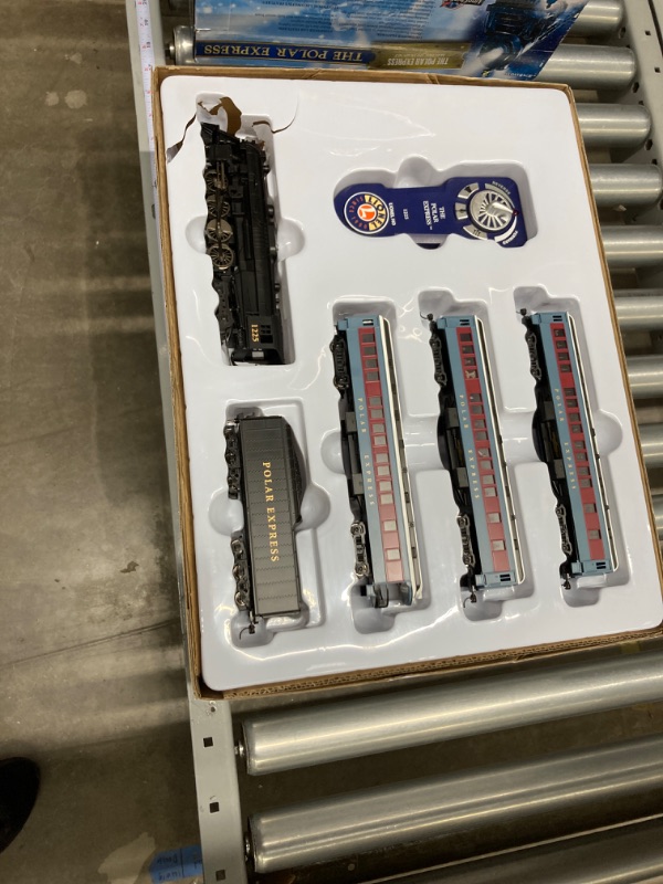 Photo 2 of Lionel The Polar Express, Electric HO Gauge, Model Train Set w/ Remote and Bluetooth Capability + 4 Additional Pieces of 20" Radius Straight + 4 Radius Curve MagneLock Track Complete Set + Expansion Track (Straight & Curved)