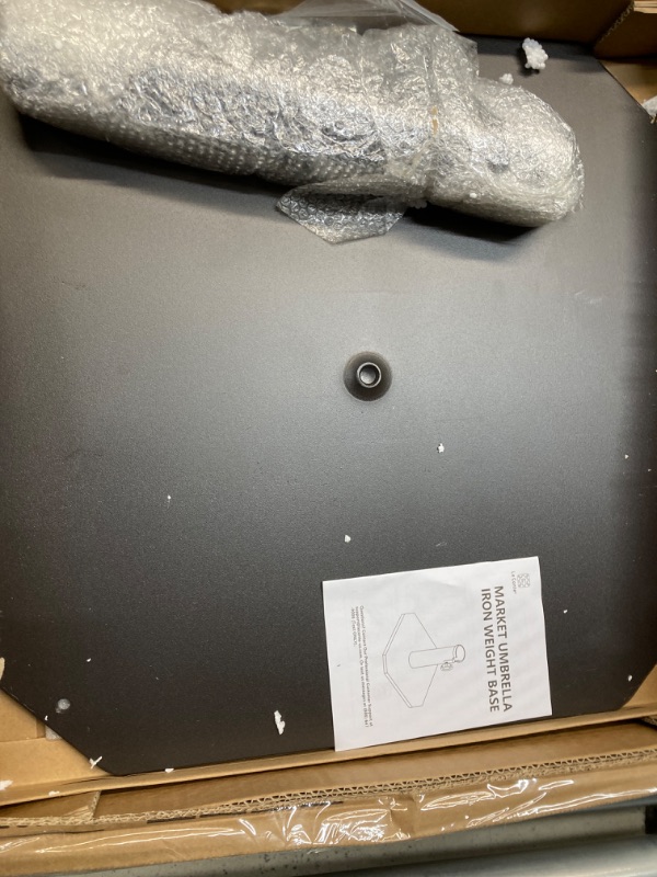 Photo 1 of 50 lbs. Round Concrete Filled Weighted Powdercoated Steel Umbrella Base, Black Frame
