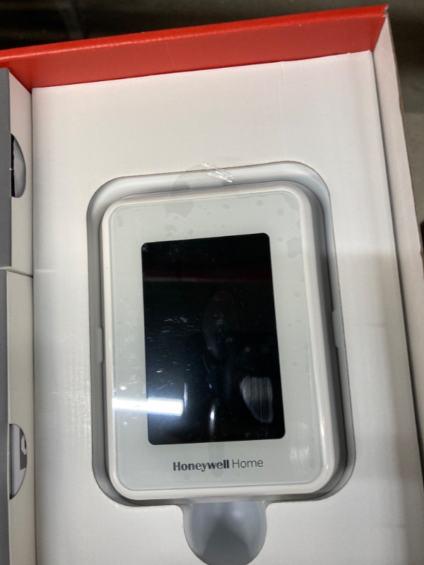 Photo 3 of **MISSING PARTS**Honeywell Home T9 WiFi Smart Thermostat with 1 Smart Room Sensor, Touchscreen Display, Alexa and Google Assist A. Wi-Fi Thermostat w/Sensor