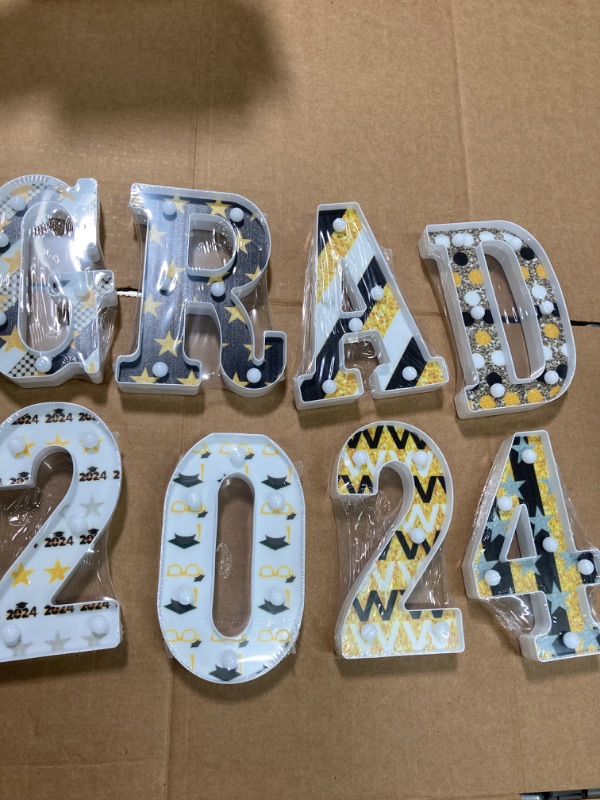 Photo 2 of 2024 Graduation Party Decorations-8 LED Marquee Letter Lights Grad 2024 Sign - Graduation Decorations Class of 2024 for Kindergarten Preschool High School College Wall Table Ornaments(Black and Gold)