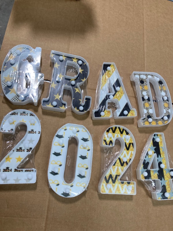 Photo 2 of 2024 Graduation Party Decorations-8 LED Marquee Letter Lights Grad 2024 Sign - Graduation Decorations Class of 2024 for Kindergarten Preschool High School College Wall Table Ornaments(Black and Gold)