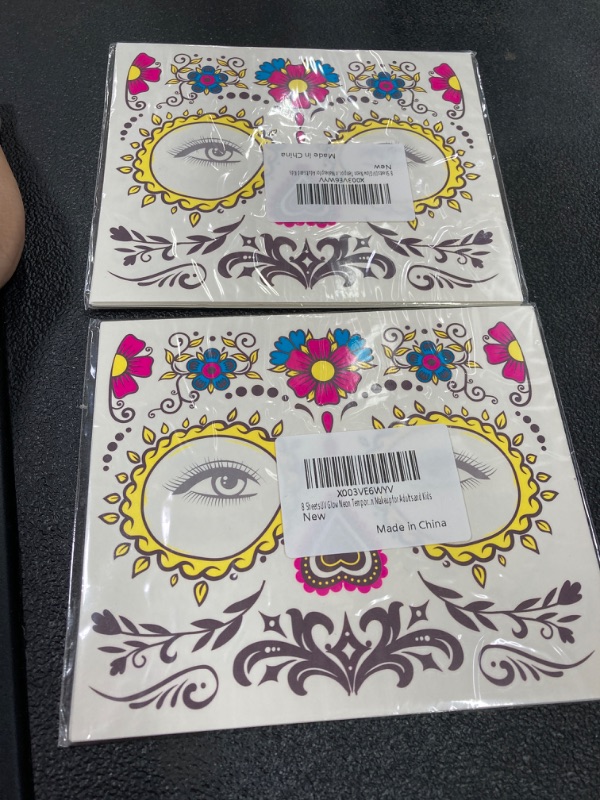 Photo 2 of **2 Pack** 8 Sheets Halloween Day of The Dead Face Tattoos,Sugar Skull Tattoos Glow UV Neon Temporary Tattoos for Women Halloween Christmas Festival DIY Makeup Party Props Design 02