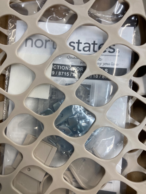 Photo 1 of Toddleroo by North States 42” Wide Supergate Ergo Baby Gate, Made in USA: For Doorways or stairways. Includes Wall Cups. Pressure or Hardware Mount. 26” - 42” Wide (26" Tall, Sand)