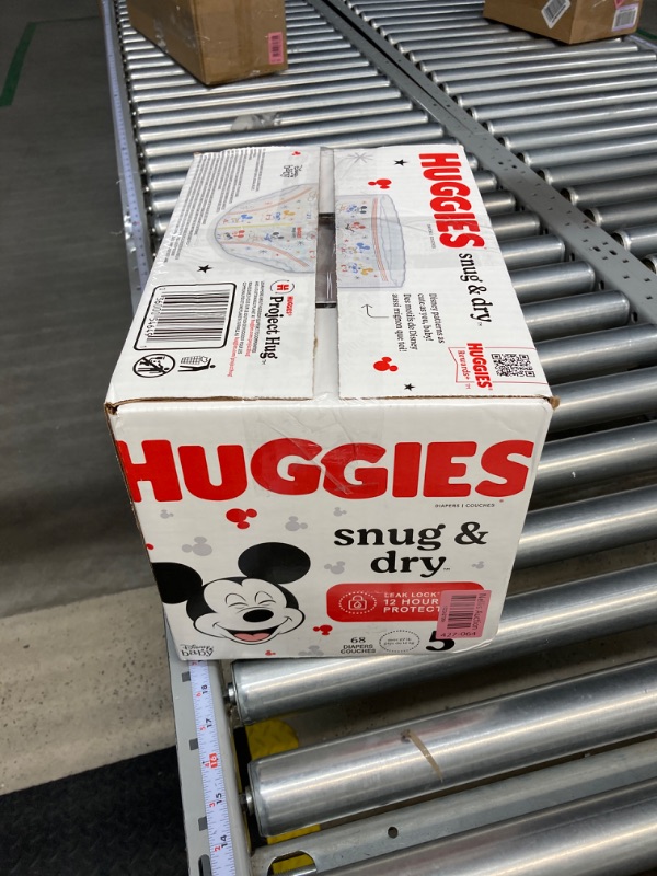 Photo 3 of Huggies Snug & Dry Baby Diapers, Size 5 (27+ lbs), 68 Ct Size 5 (68 Count)