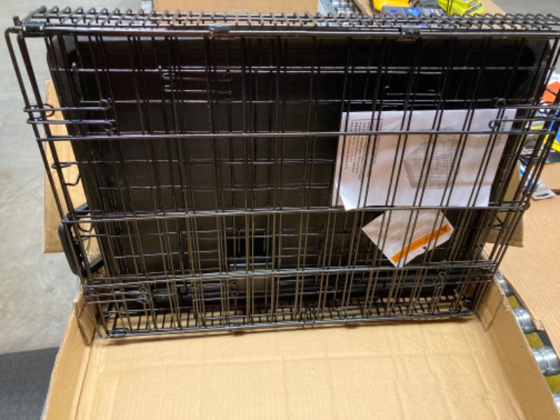 Photo 1 of Amazon Basics Foldable Metal Wire Dog Crate with Tray, Single Door, 24 Inch 24" Single Door w/ Divider Crate