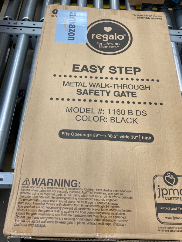 Photo 2 of * FACTORY SEALED **Regalo Easy Step 38.5-Inch Extra Wide Walk Thru Baby Gate, Award Winning Brand, Includes 6-Inch Extension Kit, 4 Pack Pressure Mount Kit, Black, 4 Pack Wall Cups and Mounting Kit 38.5" Wide Black