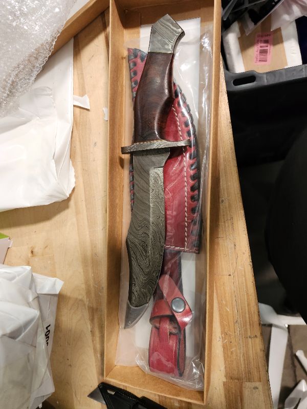Photo 1 of Handmade Damascus steel knife 13" with expensive sheath included. Rosewood Handle with Damascus steel Guard and But. 7.5" twist pattern Damascus blade designed for camping, hunting and all other outdoor uses