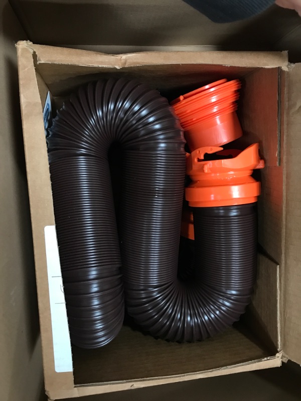 Photo 1 of Camco RhinoFLEX RV Sewer Hose Kit with Swivel Transparent Elbow and 4-in-1 Dump Station Fitting, Brown, 15 Feet (39770) 15ft Sewer Hose Kit Frustration-Free Packaging