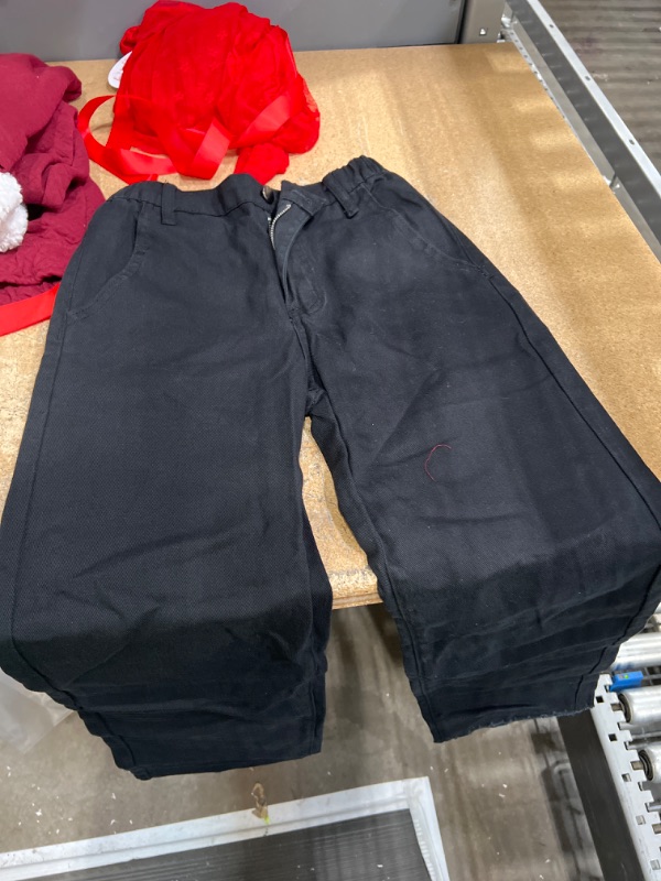 Photo 1 of BLACK PANTS SIZE 12-13 Y 