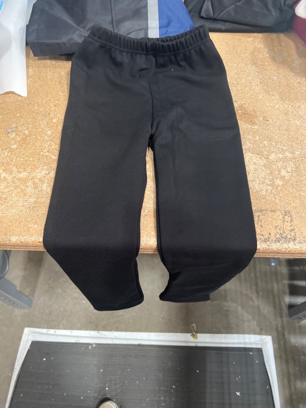 Photo 1 of BLACK PANTS FOR KIDS SIZE 6Y 