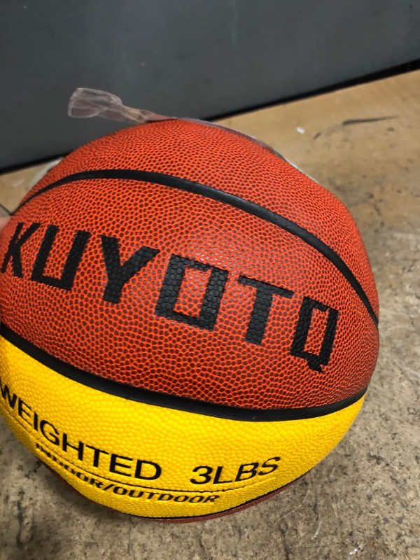 Photo 2 of KUYOTQ 3LBS/3.3LBS 29.5' Weighted Basketball Composite Indoor Outdoor Heavy Trainer Basketball for Improving Ball Handling Dribbling Passing and Rebounding Skill (deflated, Size 7)
