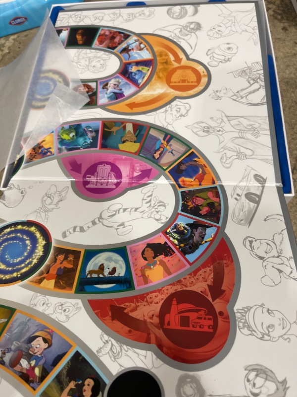 Photo 1 of **USED READ NOTES**PlayMonster The Magical World of Disney Trivia: 100 Years of Wonder Trivia Board Game Cards for Children with Disney + Pixar Art, Exclusive Pin, for Kids Ages 6+