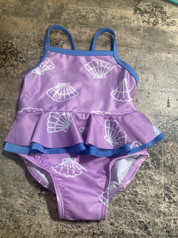 Photo 1 of Baby’s purple 1 piece bathing suit size 6-9 months 