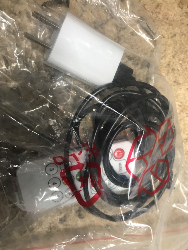 Photo 1 of Remote Control and charger