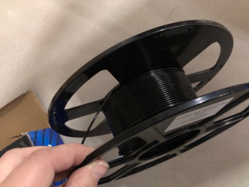 Photo 2 of ***SIGNIFICANT PORTION IS USED***
Flashforge 3D Printer Filament PLA 1.75mm, 3D Printing Filaments 1kg Spool-Dimensional Accuracy +/- 0.02mm, Environmental Friendliness, no Smoke and no Odor (Black, PLA) Black PLA