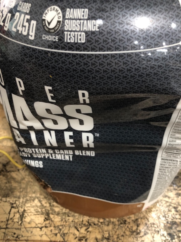 Photo 2 of **EXPIRES 5/2024**NON REFUNDABLE**
Dymatize Super Mass Gainer Protein Powder, 1280 Calories & 52g Protein, 10.7g BCAAs,  Chocolate, 6 lbs